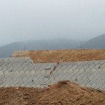 You can still see what the mountain looks like in the higher terrace which hasn't been covered yet. Sandstone ranging from white to red.