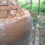 Rear. Filling the cracks with mud was fun. Nice, soft mud, slung it right in there, makes a satifying splat.