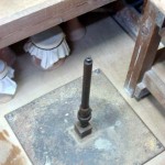 axle_pinrest_sleeve shaft assembly, welded to steel plate, bolted to sheet of plywood.