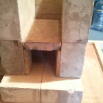 floor/shelf propped up with brick slices