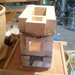 Front half of chimney is one brick capping the front, and bound in place