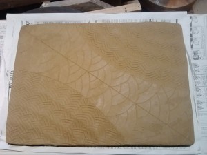 stamped pattern finished, pattern for carving drawn in.